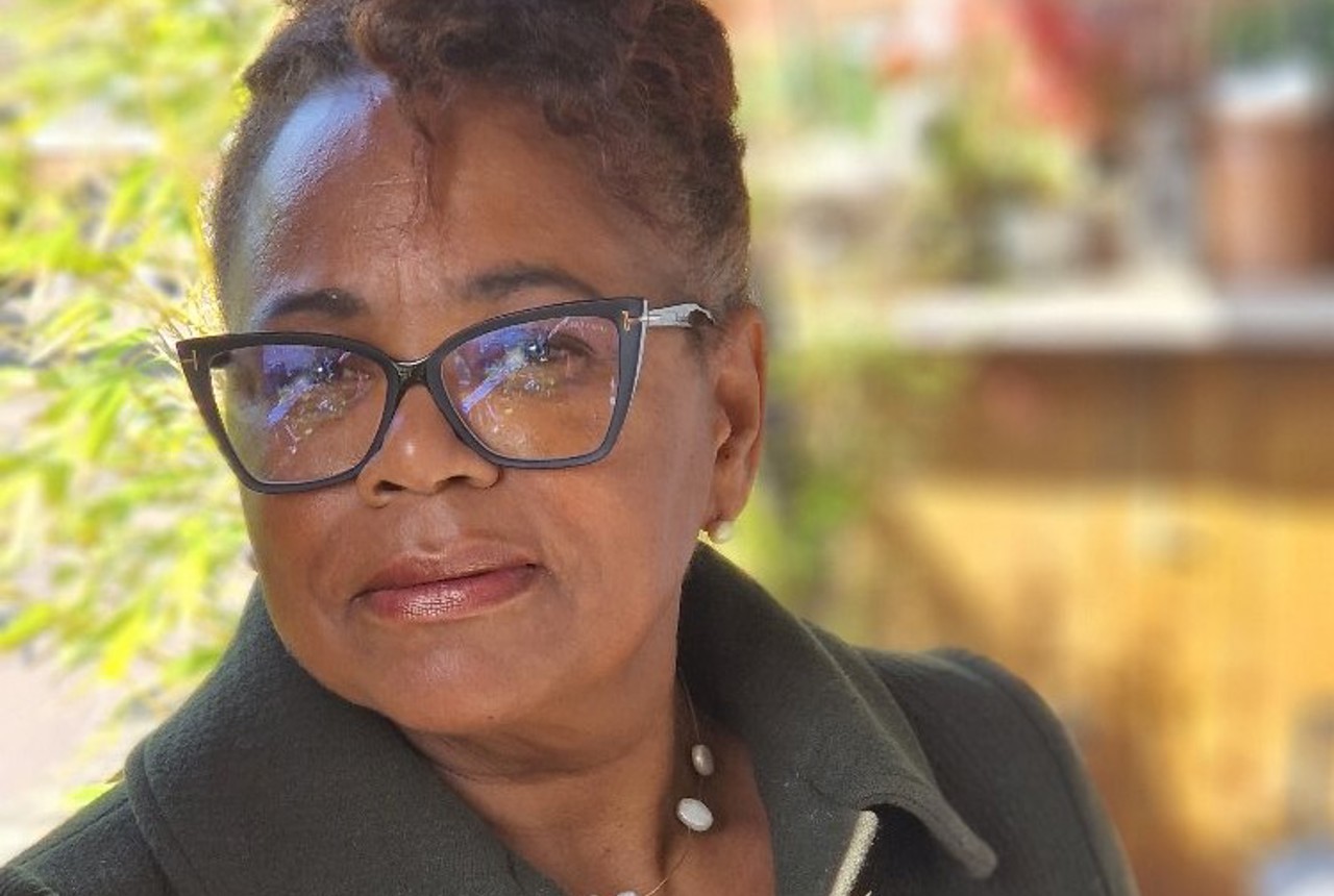 Rosemarie Jenkins, Housing 21 Board Member, looks into the camera and smiles 