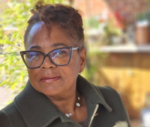 Board Member Rosemarie Jenkins smiles into the camera