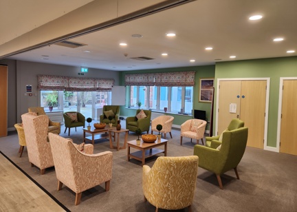Residents lounge with soft seating and coffee tables