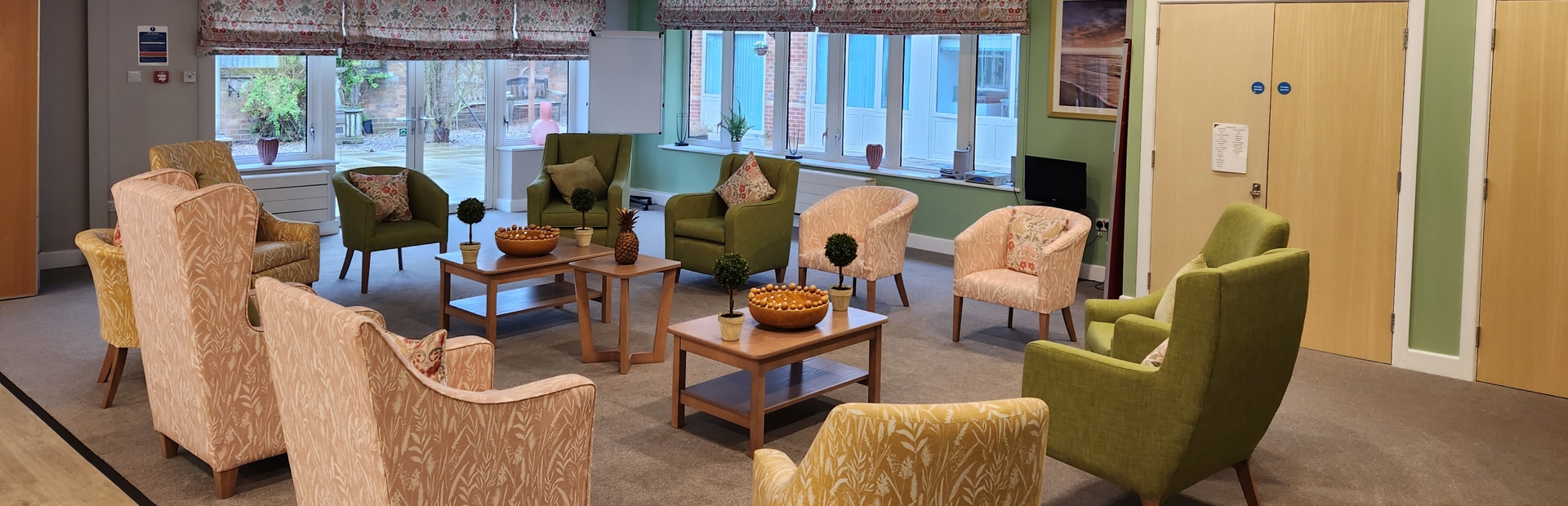 Residents lounge with soft seating and coffee tables