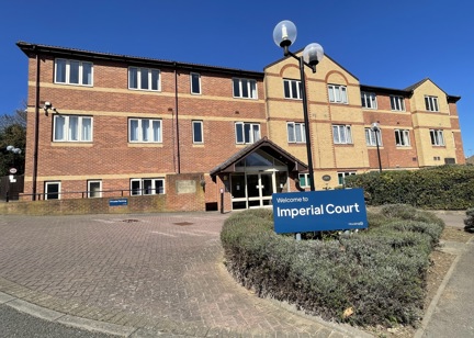 Outer building of Imperial Court surrounded by greenery 