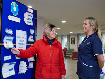 EC Linskill Park Careworker Resident Talking Noticeboard