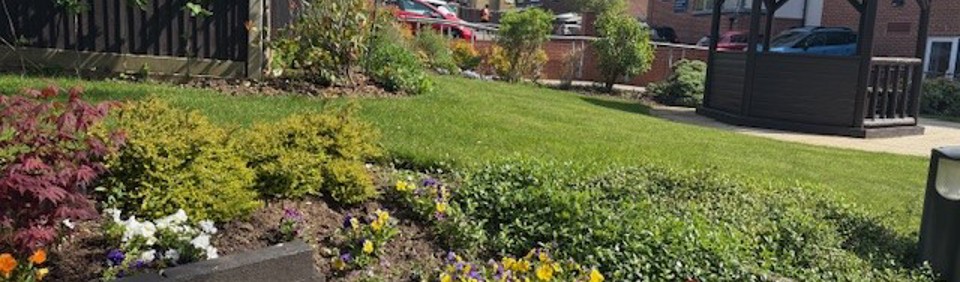 Flower beds and pagoda at Lea Springs 