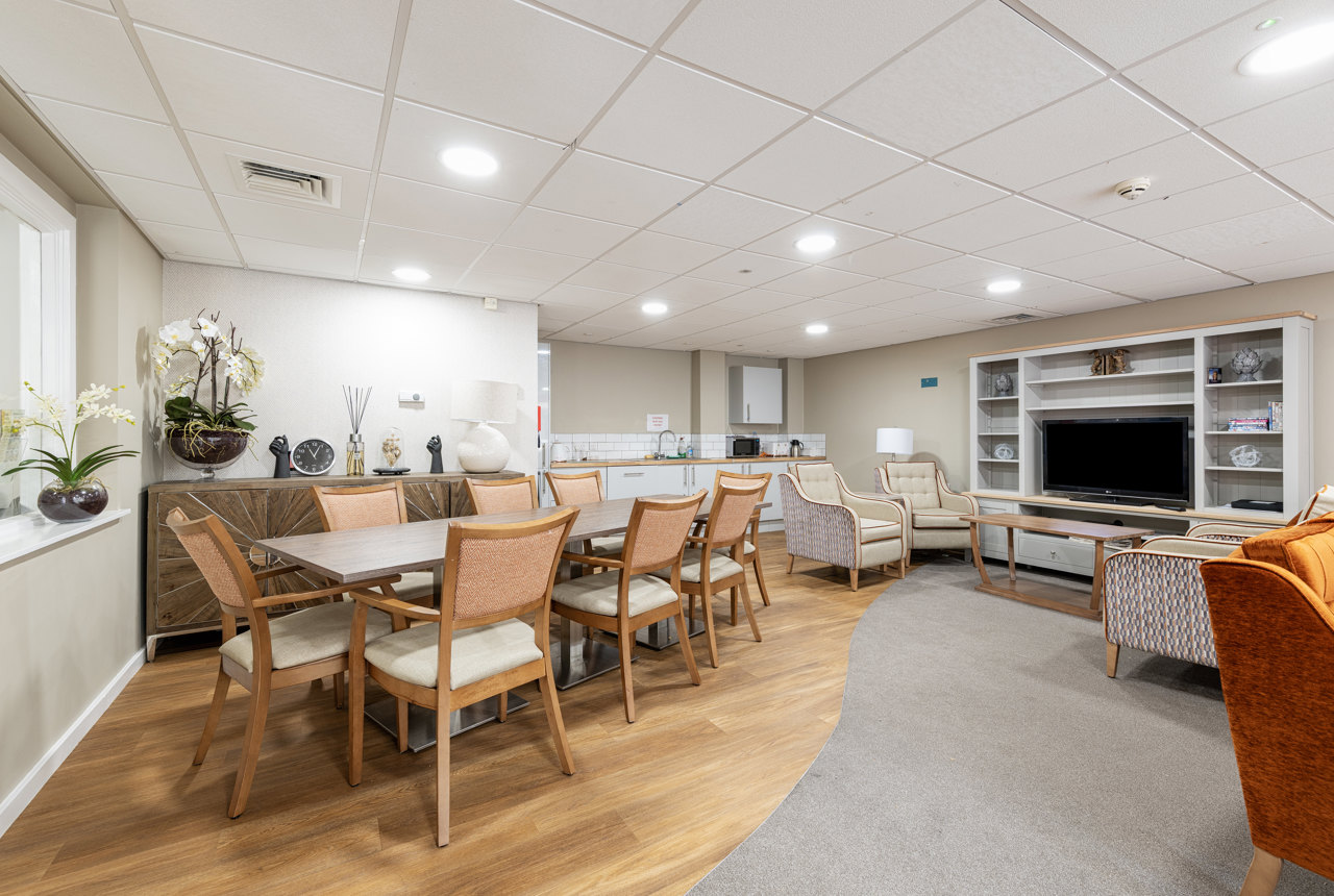 a communal kitchen with dining table