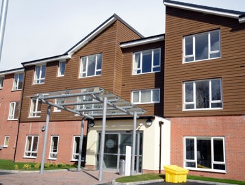 Entrance to with large glass canopy above the doorway Keelboat Lodge