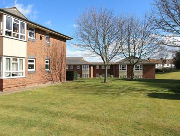 External photo of the gardens at the side of Absalom Court