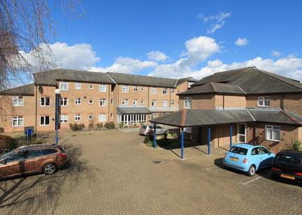 Car park and entrance to the side of Anne Figg Court