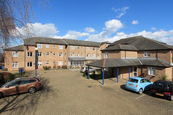 Car park and entrance to the side of Anne Figg Court