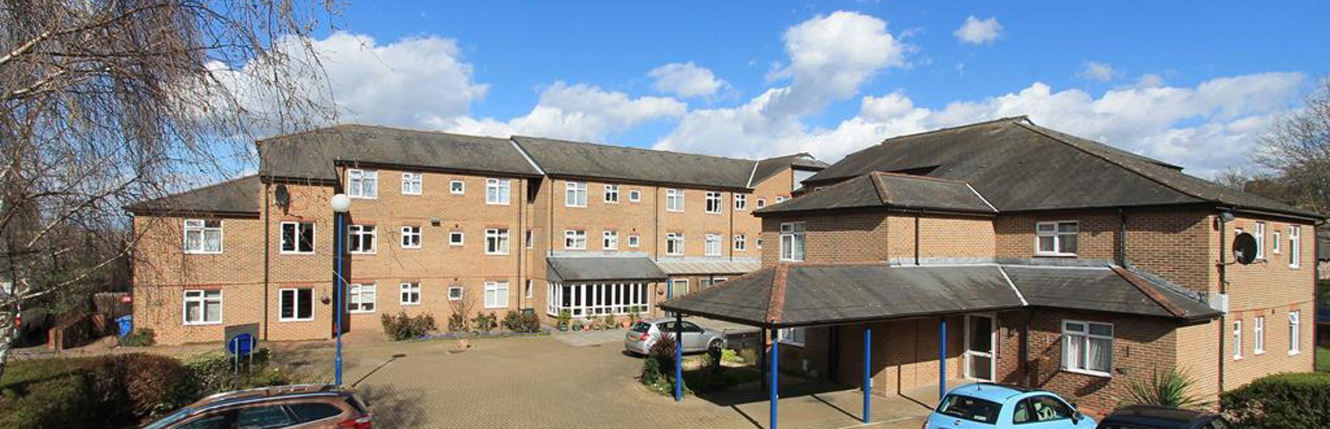 Car park and entrance to the side of Anne Figg Court