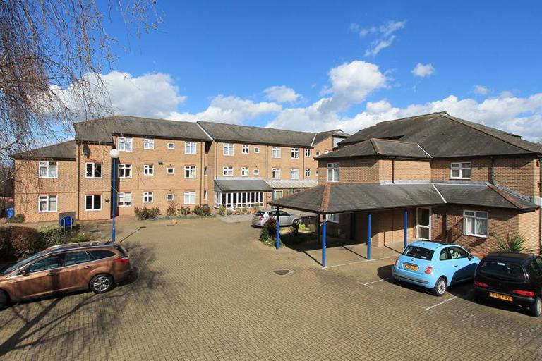 Car park and entrance to the side of Anne Figg Court