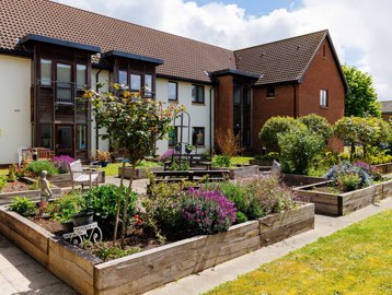 Mere View Court surrounded by landscaped gardens