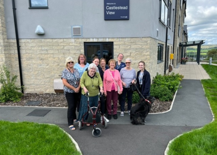The Care Team at Castlestead View with residents.