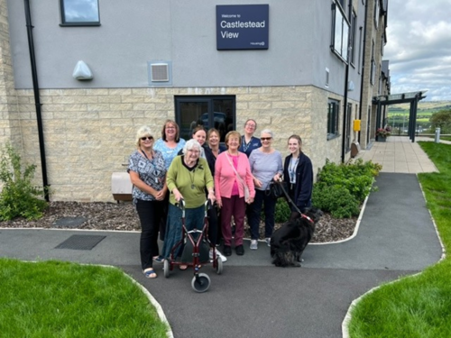 The Care Team at Castlestead View with residents.