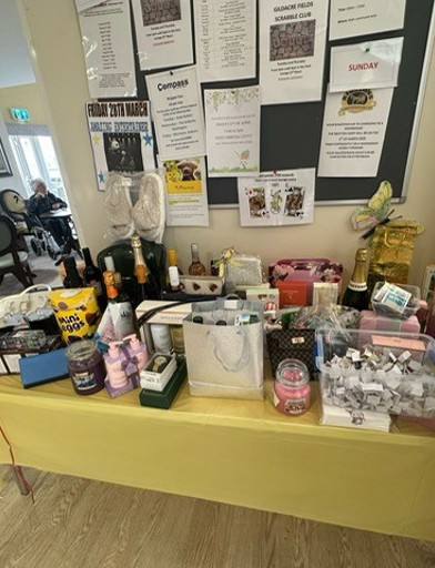 A table full of raffle prizes 
