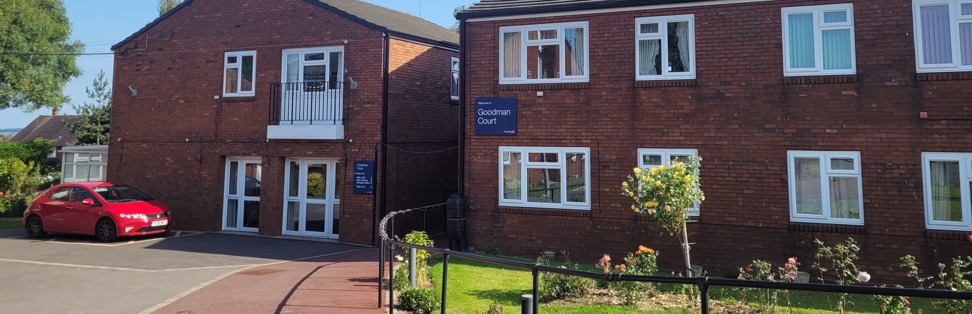 A photo of the front entrance of Goodman Court