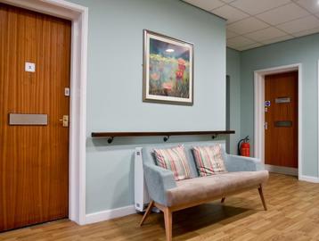 Seating in a communal hallway of Alan Hilton Court