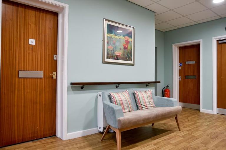 Seating in a communal hallway of Alan Hilton Court