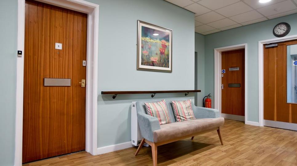 Seating in a communal hallway of Alan Hilton Court